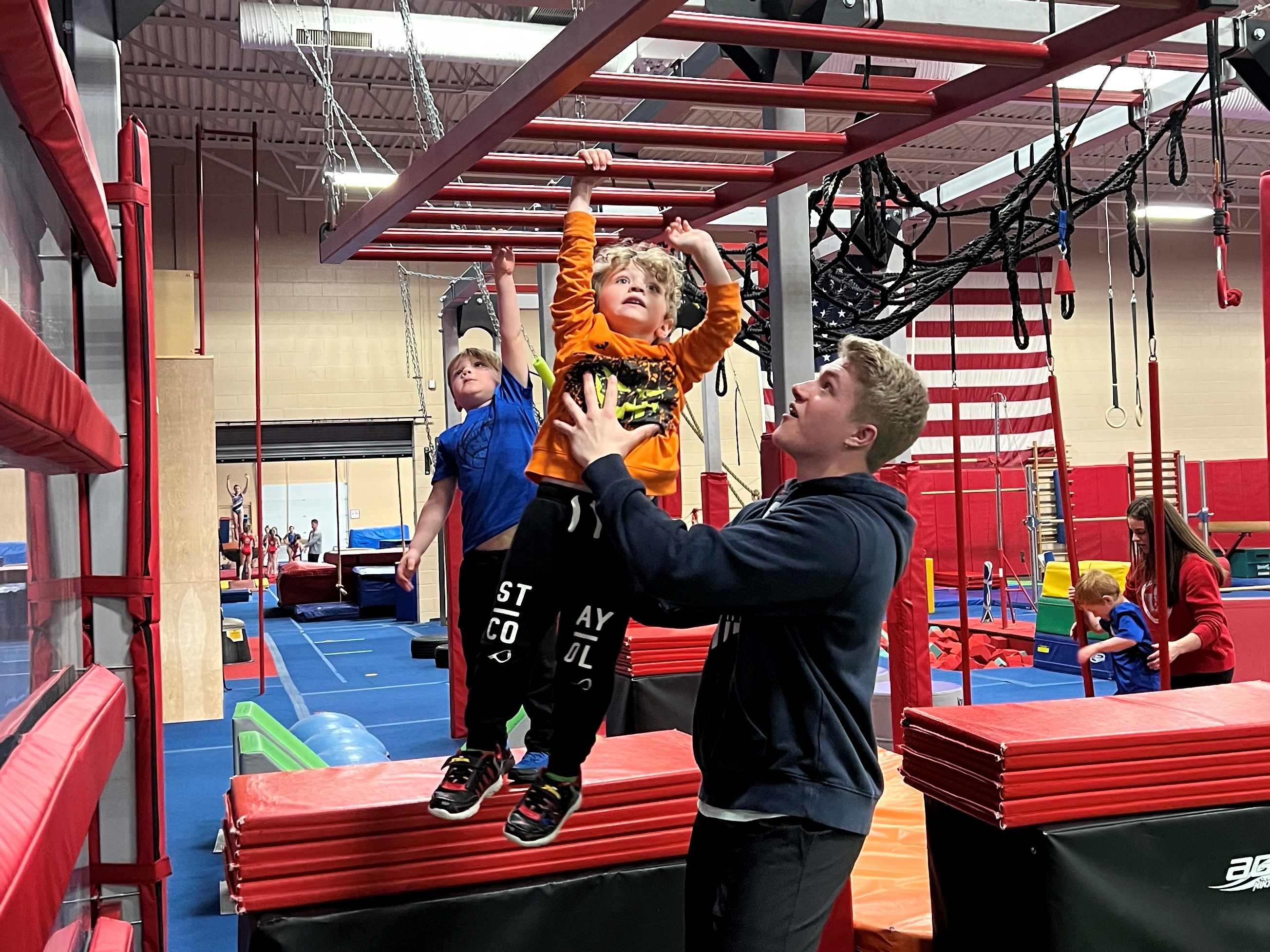 Adrian spotting monkey bars